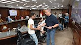 الجيزة تسلم 12 عقد عمل لذوي الهمم (1)