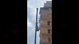  إزالة الأدوار العليا لبرج أمبروزو المائل في الإسكندرية (4)
