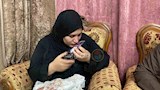 شقيقة المجني عليه خلال تقبيل صورته