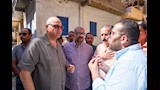 محافظ الإسكندرية مع قاطني العقارين المائلين (8)