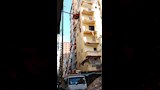 إنزال أثاث الأسر المتضررة من عقاري إمبروزو وكرموز بالإسكندرية (2)