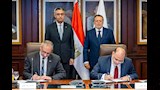 حسن عبدالله وشريف فاروق يشهدان توقيع بروتوكول لدعم الشمول المالي (