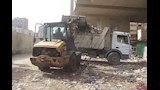 القضاء على بؤرتي قمامة بترعة الزمر والمنيب