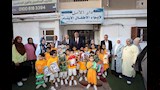 صورة جماعية للمحافظ مع الأيتام