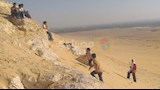 بالصورـ تسلق الجبال والتزلج على الرمال يجذبان شباب أسيوط خلال عيد الأضحى