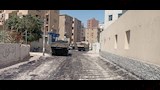بدء رصف شارع مجلس المدينة القديم بمدينة منفلوط لتحسين الحركة المرورية والخدمات