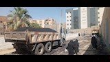 بدء رصف شارع مجلس المدينة القديم بمدينة منفلوط لتحسين الحركة المرورية والخدمات
