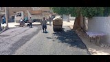 بدء رصف شارع مجلس المدينة القديم بمدينة منفلوط لتحسين الحركة المرورية والخدمات
