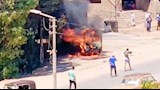 تحولت لهيكل معدني وخردة.. النيران تلتهم "ميكروباص" داخل مغسلة في أسيوط -صور