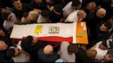 مصحف وعلم مصر.. صور جديدة من جنازة هاني شاكر 
