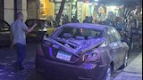 تحطم سيارة انهارت عليها شرفة عقار بالإسكندرية- صور