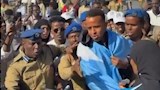 استقبال شعبي للحكم الصومالي عمر أرتان بعد رفض دخوله أمريكا (صور)
