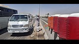 عم خالد يروي عطش المسافرين في عز الحر على صحراوي أسيوط (11)