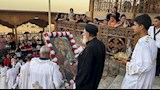 دير الجنادلة يتلألأ بالشموع.. توافد واسع على احتفالات "حالة الحديد" بأسيوط (صور)
