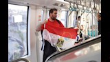 إقبال الجماهير على مونوريل العاصمة لمتابعة مصر وبلجيكا (14)