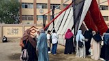 عيون تراقب البوابات.. "أمهات السويس" يرابطن أمام لجان الثانوية في أول أيام الامتحانات -فيديو وصور