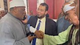 الدكتور عباس شومان والوفد المرافق له بزيارة أسر الضحايا 