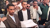 بالصور.. "الكفن" ينهي 5 سنوات من النزاع بين عائلتين في أسيوط
