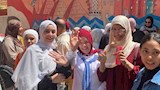 ابتسامة وسادة على وجوه الطالبات