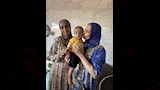 ام فارس مع حفيدها