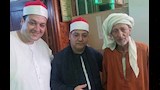 صورة للشيخ عوض ولجنة التحكيم
