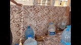 ملء زجاجات المياه بمياه الآبار