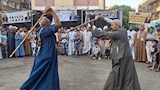 عصا المحب في ساحة سلطان الصعيد.. تراث التحطيب يخطف أنظار زوار مولد الفرغل بأسيوط – فيديو وصور