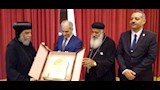 رجال الدين المسيحي يكرمون رئيس الجامعة