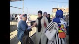 توزيع الحلوى على طلاب الثانوية العامة في بورسعيد٢