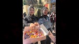 توزيع حلويات ومياه على طلاب بورسعيد ١_1