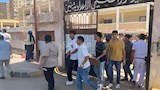 أثناء خروج الطلاب من اللجنة 