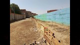 دهان الأسوار وتشجير الشوارع