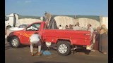 انقلاب سيارة عمال على محور 30 يونيو