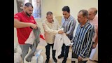 توزيع الملابس 