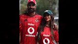 كريم فهمي وزوجته بتيشرت الأهلي