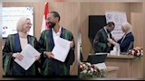 ناقشهما أشرف زكي وأيمن الشيوي.. زوجان يحصدان الماجستير بامتياز في يوم واحد – صور