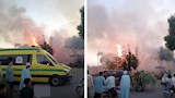 السيطرة على حريق التهم عددًا من أشجار النخيل بأرمنت في الأقصر -صور