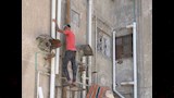 أعمال تطوير مناطق سكنية قديمة في بورسعيد٣