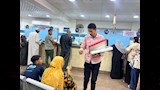 توزيع حلوى المولد على المواطنين بمكتب تأمينات أسيوط (26)