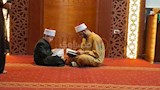 أب وابنه يتنافسان في مسابقة دولة التلاوة بأسيوط (2)