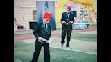 طربوش وكتاب بأيدي طلاب بورسعيد٢