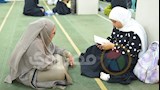 "رضيعتها على كتفها والقرآن في قلبها".. رحلة "هبة" لسرد 30 جزءاً في 5 ساعات
