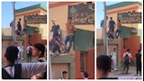طلاب أعلى سور مدرسة بنات بشبين القناطر.. والأمن يتدخل بعد غضب الأهالي