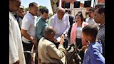 محافظ أسيوط يوجه بتوفير كرسي كهربائي لمسن من ذوي الهمم  (5)