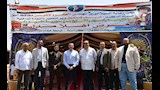 محافظ أسوان ووكيل وزارة التموين أمام معرض اهلا مدارس