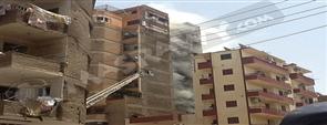 حريق هائل يلتهم برج سكني بوسط مدينة أسيوط 