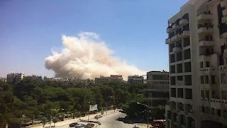 انفجار مستودع للذخيرة قرب مطار حلب في شمال سوريا