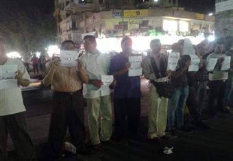 بالصور- سلسلة بشرية بدوران شبرا تحت عنوان ''المتحرشين لا دين لهم''