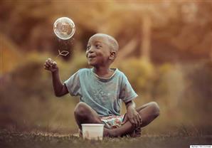 بالصور- مصور جمايكي يلتقط صورا رائعة تبين براءة الطفولة