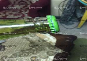 بالفيديو- شوائب داخل زجاجة مياه غازية.. والشركة المنتجة: "خارج الخدمة"